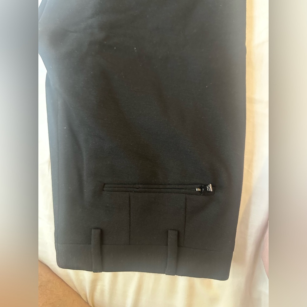 Corneliani Black wool joggers with button fasting